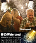 People enjoying under IP65 waterproof App Remote Solar String Lights 50Ft Waterproof Edison Bulbs For Balcony Or Umbrella.