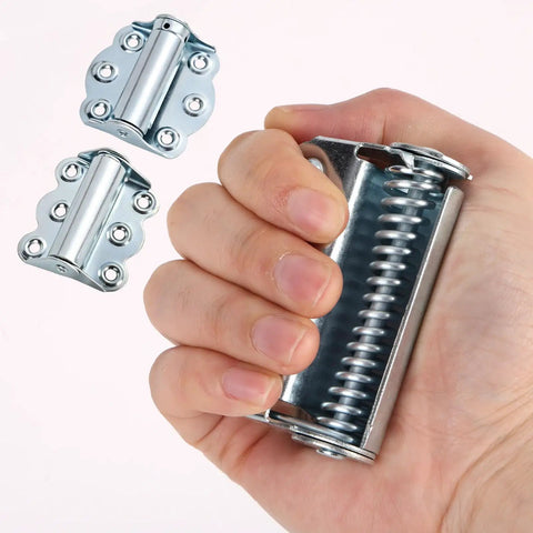 Solid As A Rock Self Closing Door Hinges 3 Piece Set in hand, showing zinc springs and hinge design for kitchen cabinets.