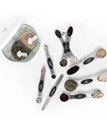 Magnetic Measuring Spoons Set Stainless Steel With Leveler Seven Piece Double Headed Spoons arranged with beans and grains