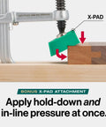 MatchFit Dovetail AP Clamp With X Pad for Router Tables and CNC Fixtures showing X-Pad applying pressure on wood.
