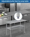 Stainless steel table with Workhorse Adjustable Bullet Feet For One And Five Eighths Inch Tubing in industrial kitchen setting