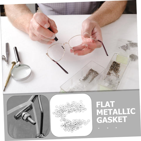 Man repairing rimless glasses with Eyeglass Frame Gaskets And Metal Flat Washers Must Have Kit With 200 Pcs Replacement Screws.