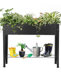 Raised Garden Bed With Legs Elevated Metal Planter Box For Outdoor Use Yard Ready Standing Garden Stand For Veggies, Herbs, And Flowers Durable Steel Frame With Drainage Holes Frosted Black Finish Easy Assembly filled with plants and gardening tools below.