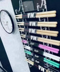 Keep Your Kit Tidy And Looking Fly With This Premium Clear Acrylic Drumstick Holder Display Rack holding multiple drumsticks.