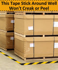 Six Rolls Black And Yellow Caution Tape 2In By 108Ft Floor Marking Tape for Clear Pathways and Safety Zones on warehouse floor.