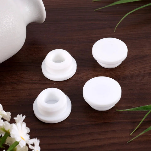 Top Shelf Rubber Sink Overflow Cover Cap 3 Pack White Silicone Drain Guard For Kitchen And Bathrooms on wooden surface.