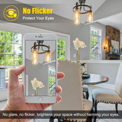 Hand holding phone showing Dimmable Vintage LED Edison Bulbs Pack Of 4, 6W Equal To 60W, 700 Lumens, 2700K Warm White in cafe lighting.