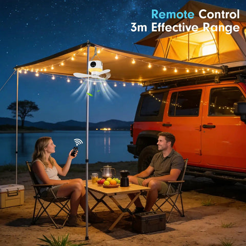 Portable Tent Fan With Built In Lights And Remote USB Rechargeable Camping Fan Wireless Tent Fan With 4 Speeds And Timer Battery Powered Ceiling Fan For RVs Trucks Rooftop Tents And Travel Camping in use, illuminating a campsite next to a Jeep with people relaxing underneath.