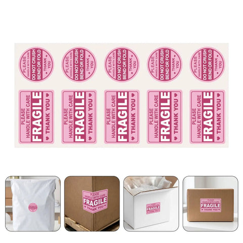 Fragile Shipping Labels Pack With Red Copper Plate Stickers For Quick ID And Clear Communication, Rectangle And Round Shapes For Courier Ops And Packing Supplies, Handle With Care. pink fragile label sheet with round and rectangle stickers on packaging