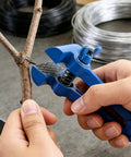 Heavy Duty Handheld Vise Pliers 50mm Mini Bench Clamp For DIY And Home Use, gripping a branch for precise work.