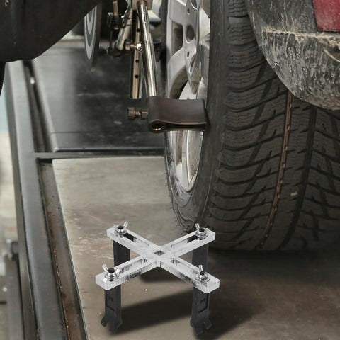 Adjustable Fuel Tank Lid Removal Tool With 4 Claw Design In Chrome Vanadium Steel For Quick Gas Cap Removal And Easy Gas Tank Access Aimed At Automotive Pros, in use by tire