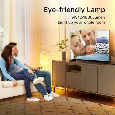 Couple on sofa with TV and Slender 39 Inch Floor Lamp With Remote Control, RGB Color Changing LED Lights For Vibe Mood Lighting nearby