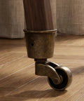 Vintage Furniture Caster Cups Featuring Slick Swivel Replacement Wheels Heavy Duty Dark Brown Metal Frame on wooden floor