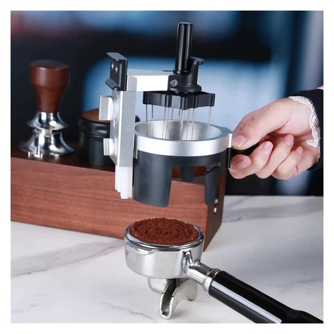 Real Talk This Rotating Espresso Coffee Distributor Hits Different With Twelve Precision Needles leveling coffee grounds in hand.