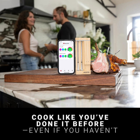 Two Probes Wireless Smart Meat Thermometer For BBQ Oven Grill Smoker And Air Fryer with phone app and cooked meat on countertop