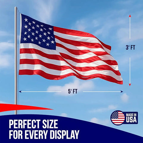 Outdoor 3x5 American Flag Made In USA With Brass Grommets Built To Last Outdoors Polycotton For Exterior Use 100 Percent Made In USA Flag With Vivid Red And Deep Blue Colors Weather Resistant FMAA Certified, waving on a flagpole against a blue sky