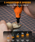 Close-up of Nitty Gritty Mini Cordless Rotary Tool adjusting speed dial, engraving wood at 18000 RPM.