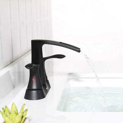 Two-Handle Waterfall Bathroom Faucet In Matte Black With Pop-Up Drain And Metal Supply Lines, water flowing into sink