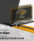 Laptop connected with Tough As Nails Outdoor 50 Ft Cat6 Cat5E Ethernet Cable 24AWG Direct Burial, showing 40Gbps speed compatibility.