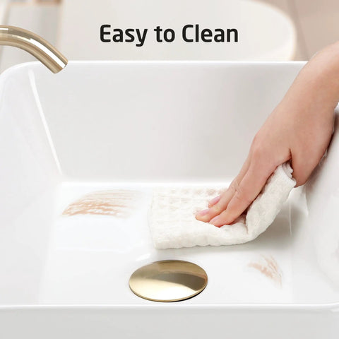 Rectangular White Vessel Sink For Bathroom Countertop With Premium Glaze, porcelain ceramic basin being cleaned with cloth