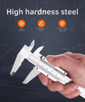 Hand holding six inch vernier caliper measuring tool with dual imperial and metric scale, fractional inch readout, high hardness steel.