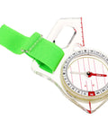 Pocket Finger Compass For Hiking And Orienteering Quick Reset Thumb Navigation Tool with green strap, trail-ready design.