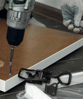 Heavy Duty Adjustable Toggle Clamp Pull Latch for Tool Boxes and Industrial Equipment near a drill in use