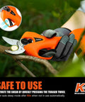 Person using Cordless Battery Powered Pruning Shear With Dual 2Ah Batteries Electric Pruner on a branch, safety features visible