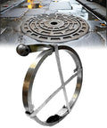 Heavy-Duty Sewer Drain Snake For Clogged Pipes And Main Lines Rock-Solid Flat Steel Cleaning Rod near drain cover for use.