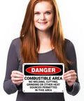 Person holding Danger Combustible Area No Welding Or Other Heat Sources Allowed OSHA Sign 10x7 Inches Aluminum.040 Rust Free