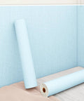 Real Smooth Peel And Stick Thermal Insulation Wallpaper With Textured Linen Finish For Cozy Bedrooms And Living Rooms Ditch Drafty Walls And Muffle Noise Effortlessly With This Removable Decor Roll, light blue roll and applied textured wall.