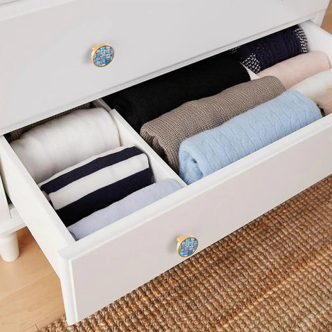 Open dresser with folded clothes and Boho Chic Cabinet Knobs And Drawer Pulls 4 Pack in Blue Pink Texture Zinc Alloy Hardware.