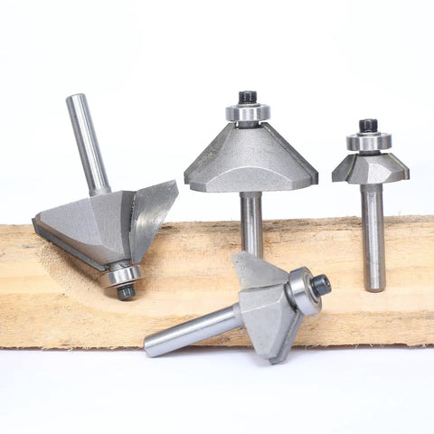 Solid Four Piece Forty Five Degree Chamfer Router Bit Set For Fine Woodworking With Quarter Inch Shank Premium Carbide Cutter on wood.