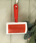 Curved Slicker Brush For Fur And Sheepskin Rugs Pet Grooming Tool With Stainless Steel Pins Hanging on Wall