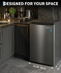 3.1 Cu Ft Upright Freezer With Sleek Stainless Steel Finish in a modern kitchen corner, showing dimensions 34.45 x 21.26 x 20.71 inches.