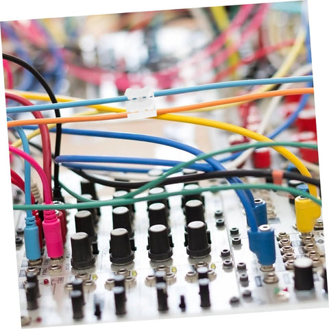 Close-up of 80Pcs Spring Clamp Terminal Connectors for LED lighting with multicolored wires on an electrical panel