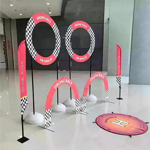 Dope FPV Drone Racing Obstacle Course Kit for Outdoor Training Customizable Gates with circular rings and landing pad.