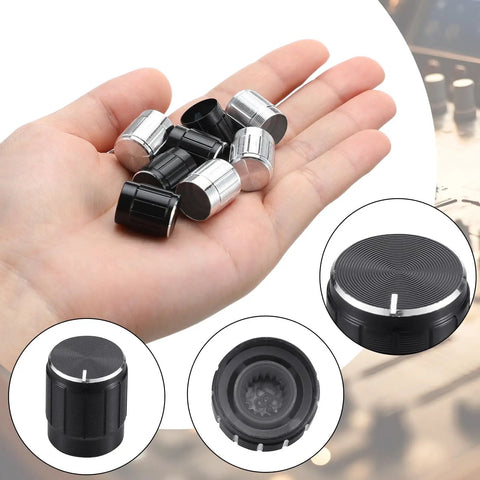 Hand holding Eight Piece Floor Lamp Dimmer Switch Knob Replacement Set Includes Four Black And Four Silver Rotary Knobs 15 x 15mm