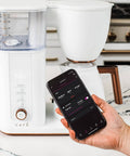 Smart Drip Coffee Maker With 10 Cup Insulated Carafe WiFi Enabled Voice To Brew Technology Matte White SCA Certified displayed in kitchen