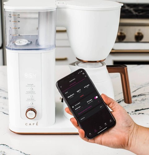 Smart Drip Coffee Maker With 10 Cup Insulated Carafe WiFi Enabled Voice To Brew Technology Matte White SCA Certified displayed in kitchen