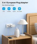 European Travel Plug Adapter With 3 Outlets And 2 USB Ports on bedside table in use
