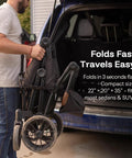 Person folding an All-Terrain Wagon Stroller For Two Kids Kid-Friendly Foldable Outdoor Beach Wagon for compact car storage.