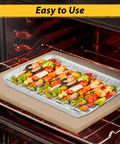 50 Pack Half Size Aluminum Pans Disposable Cookie Sheets Nonstick Baking Trays in oven with skewers