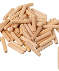 Pile of 100 Pack Wooden Dowel Pins Kit For DIYers And Furniture Repair In Genuine Imperial Size One Quarter Inch By One And One Sixteenth Inch Fluted Wood Dowels For Woodworking Projects.