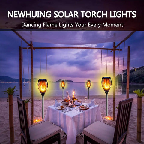 Outdoor Solar Torch Lights Set With 96 LED Beads, 43 Inch Waterproof Landscape Pathway Lamps With Realistic Dancing Flame during sunset.