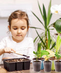 Child planting in 120 Pack 2 Inch Clear Mini Nursery Pots With Drainage Holes For Seed Starting And Seedlings, indoor gardening scene