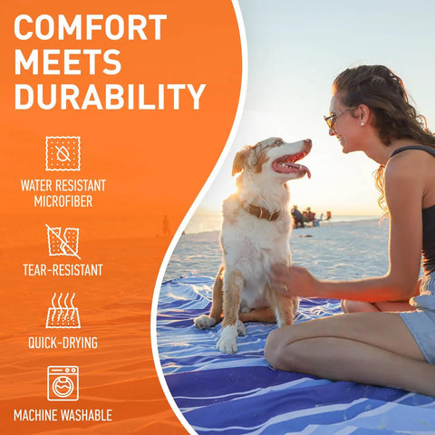 Woman with dog on Waterproof Beach Blanket Sandproof 128 By 108 Inch Big Ol Portable Picnic Mat Fits Up To 10 People at beach.
