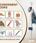Gold Metal Freestanding Coat Rack With Eight Hooks And Marble Base, displaying hats, scarves, jackets, and bags.