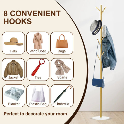 Gold Metal Freestanding Coat Rack With Eight Hooks And Marble Base, displaying hats, scarves, jackets, and bags.