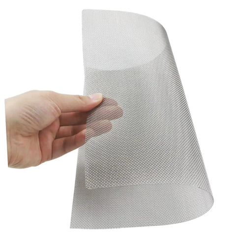 Hand holding stainless steel mesh from Four Piece Vehicle Bumper Repair Mesh Kit For Quick Easy Car Bumper Fixes Durable Automotive Mesh Screen For Versatile Bumper Repairs Simple To Use And High Efficiency Perfect For DIY Car Care.